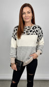 Camisola de malha cinzenta com padrão leopardo